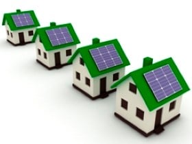 Houses with solar panels on their roofs