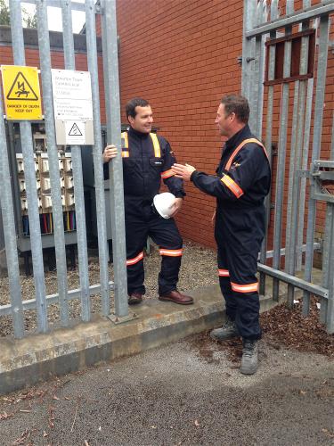 Chris Green MP being shown a substation by an ENW engineer