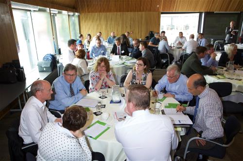 Engaging stakeholders attendees round a table