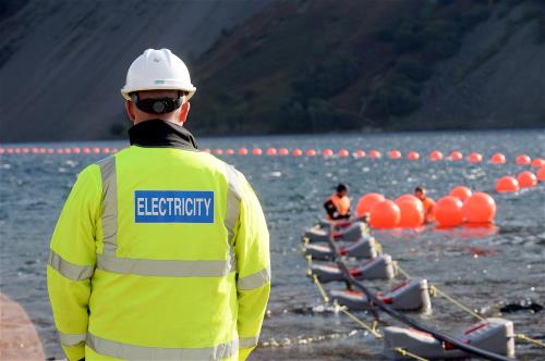 Engineer in safety jacket at Wasdale Head