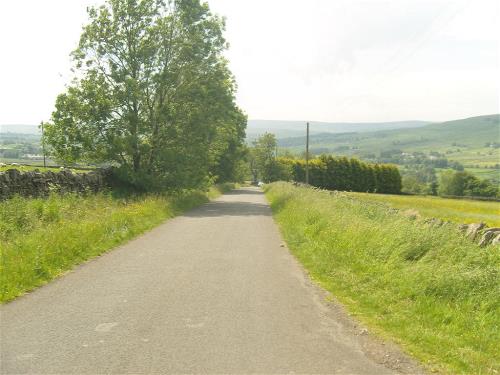 Overhead power lines on a street in the North Pennines